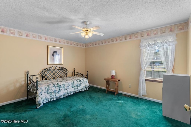 201 Cantle Ct, Jacksonville, NC 28540 - bedroom with baseboards, carpet flooring, a textured ceiling, and ceiling fan