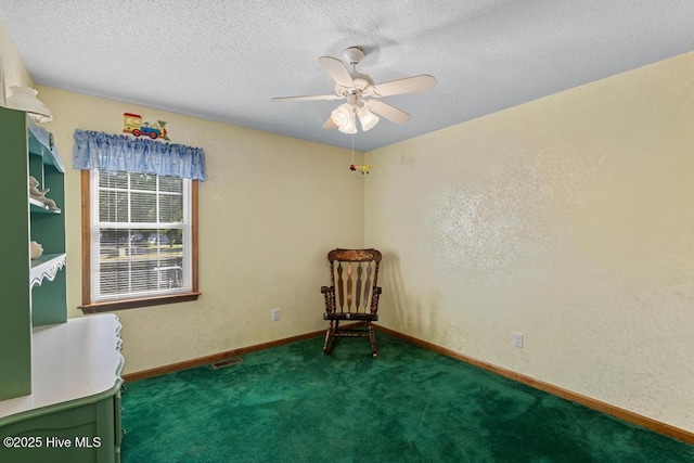 201 Cantle Ct, Jacksonville, NC 28540 - interior space featuring a ceiling fan, a textured ceiling, baseboards, carpet flooring, and visible vents