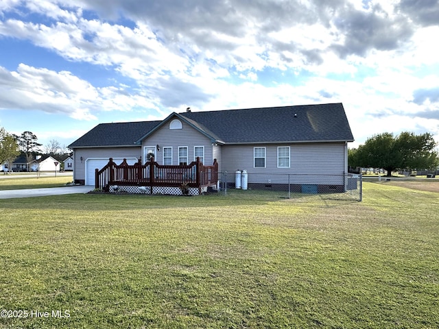 201 Cantle Ct, Jacksonville, NC 28540 - back of house with fence, a lawn, a deck, and a garage