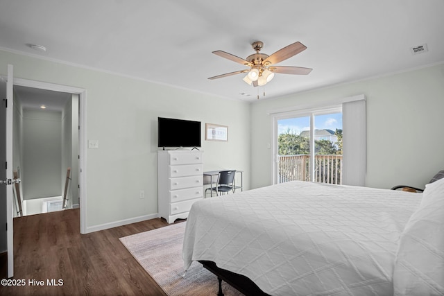 bedroom featuring ornamental molding, baseboards, access to exterior, visible vents, and wood finished floors