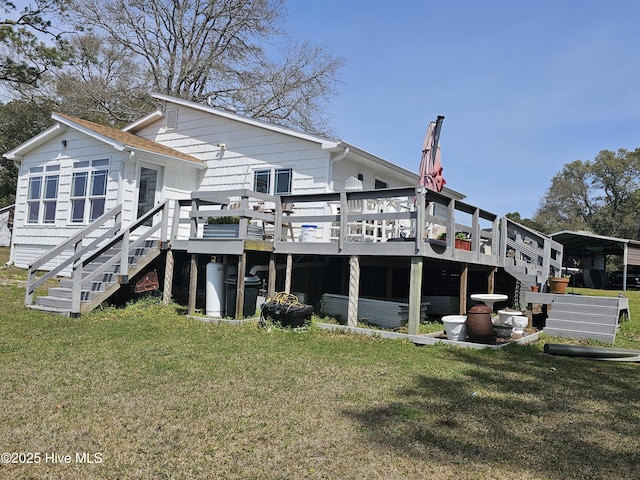 1229 Fletcher Hewett Rd SW, Shallotte, NC 28470 - back of house with stairway, a wooden deck, and a lawn