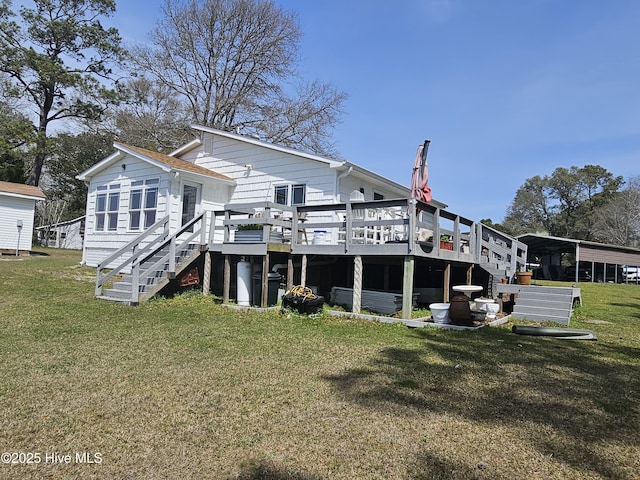 1229 Fletcher Hewett Rd SW, Shallotte, NC 28470 - rear view of house featuring stairs, a deck, a lawn, and a detached carport