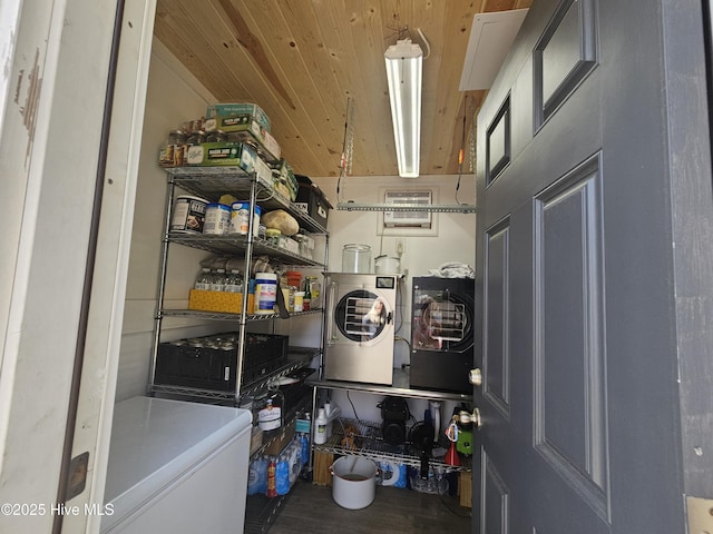 1229 Fletcher Hewett Rd SW, Shallotte, NC 28470 - storage room featuring separate washer and dryer