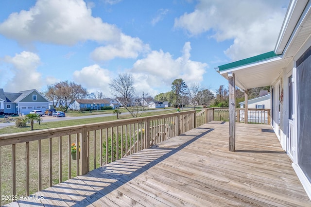 wooden terrace with a residential view