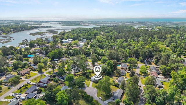 drone / aerial view featuring a water view and a residential view