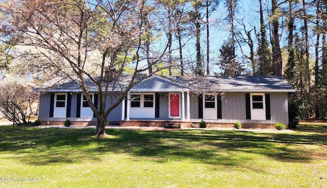 106 Hunters Trl E, Elizabeth City, NC 27909 - ranch-style home with a front lawn