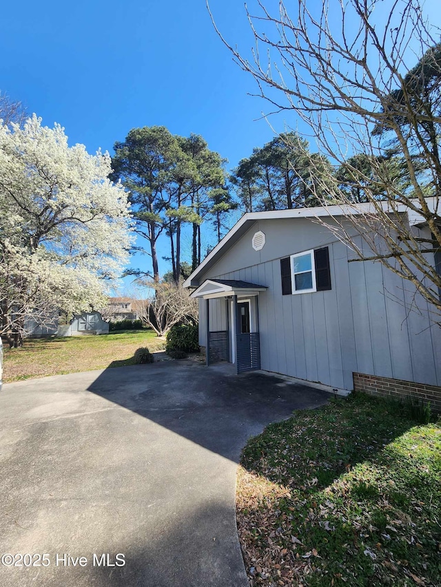 106 Hunters Trl E, Elizabeth City, NC 27909 - exterior space featuring a front yard