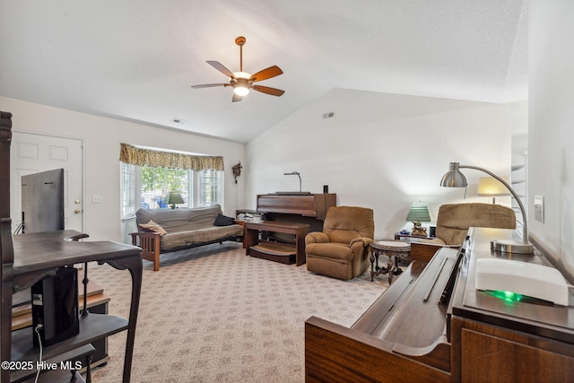 carpeted living area with visible vents, a ceiling fan, and lofted ceiling