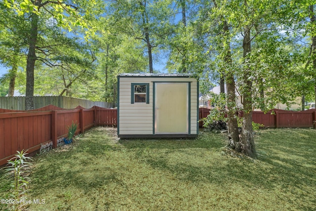 view of shed featuring a fenced backyard