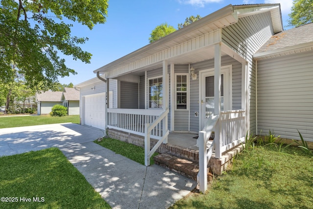 exterior space with a garage and concrete driveway