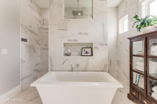 266 Twining Rose Ln, Holly Ridge, NC 28445 - bathroom with a freestanding tub, walk in shower, and marble finish floor