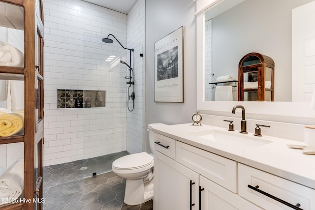 266 Twining Rose Ln, Holly Ridge, NC 28445 - full bath featuring tile patterned flooring, vanity, toilet, and tiled shower