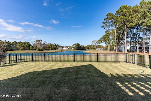 266 Twining Rose Ln, Holly Ridge, NC 28445 - view of yard featuring a water view and fence