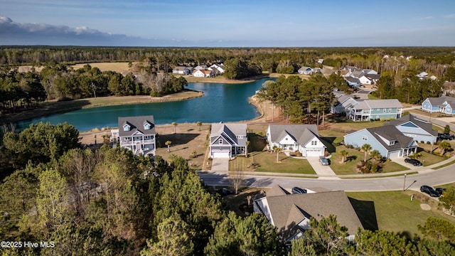 266 Twining Rose Ln, Holly Ridge, NC 28445 - birds eye view of property featuring a water view, a residential view, and a forest view