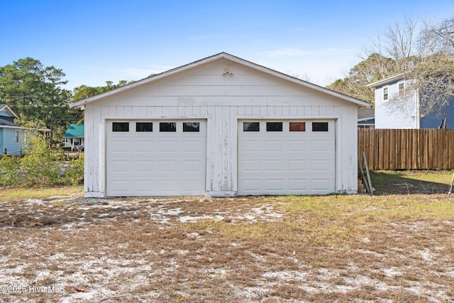 detached garage with fence