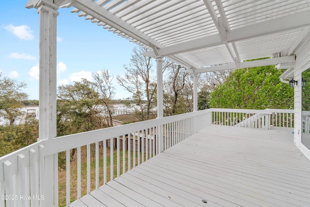 wooden terrace with a pergola