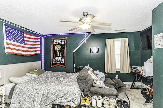 200 Emerson Dr, Rocky Mount, NC 27803 - bedroom with a textured ceiling, visible vents, a ceiling fan, and carpet