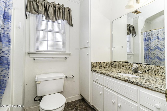 200 Emerson Dr, Rocky Mount, NC 27803 - full bath with crown molding, toilet, vanity, baseboards, and visible vents