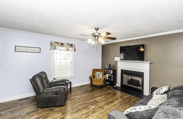 200 Emerson Dr, Rocky Mount, NC 27803 - living area featuring a ceiling fan, ornamental molding, and wood finished floors
