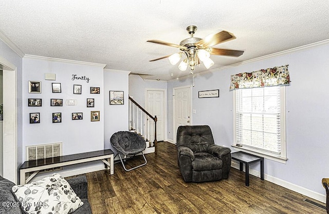 200 Emerson Dr, Rocky Mount, NC 27803 - living area featuring dark wood-style flooring, a textured ceiling, ornamental molding, stairway, and a ceiling fan