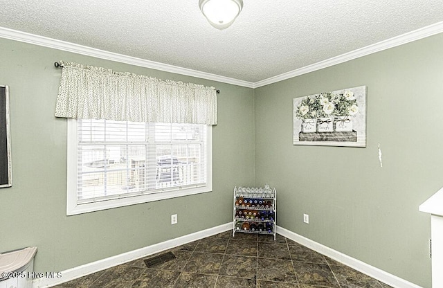 200 Emerson Dr, Rocky Mount, NC 27803 - unfurnished room featuring baseboards, visible vents, crown molding, and a textured ceiling