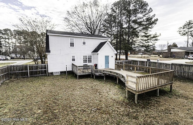 200 Emerson Dr, Rocky Mount, NC 27803 - back of property with a wooden deck and a fenced backyard
