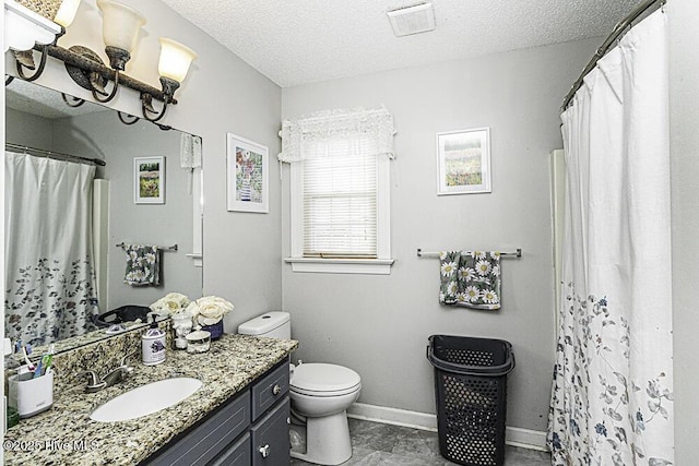 200 Emerson Dr, Rocky Mount, NC 27803 - full bath with baseboards, a textured ceiling, a wealth of natural light, and visible vents