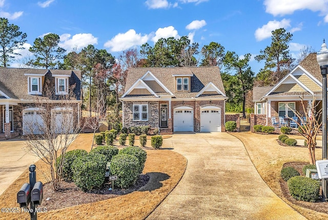 9353 Honey Tree Ln NW, Calabash, NC 28467 - craftsman house with concrete driveway and brick siding