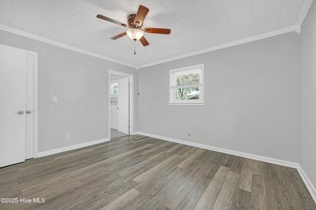302 NE 60th St, Oak Island, NC 28465 - unfurnished room featuring wood finished floors, ornamental molding, baseboards, and ceiling fan