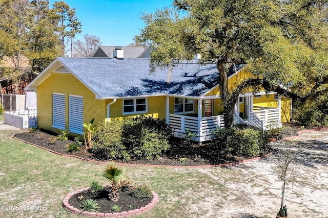 302 NE 60th St, Oak Island, NC 28465 - view of front facade featuring roof with shingles