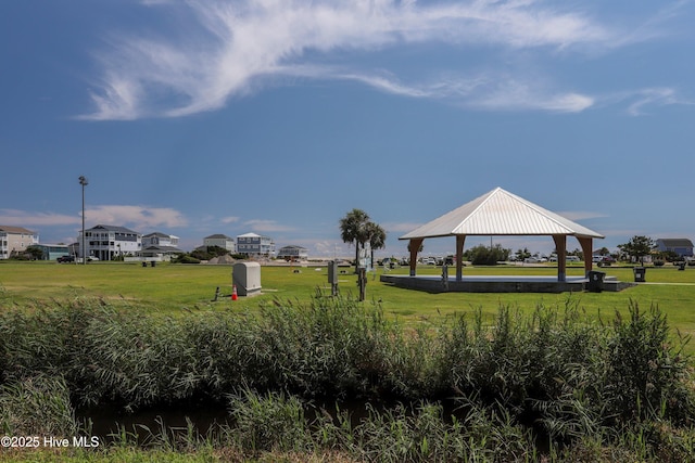 302 NE 60th St, Oak Island, NC 28465 - view of property's community featuring a gazebo and a yard