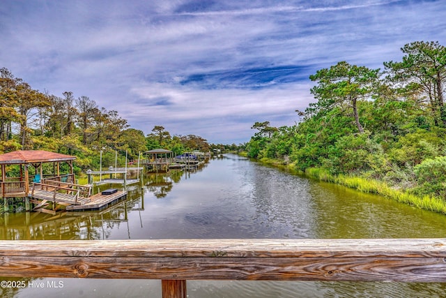 302 NE 60th St, Oak Island, NC 28465 - dock with a water view