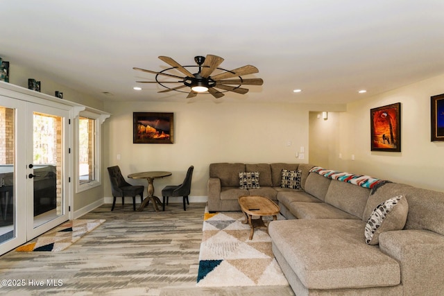 86 Sakonnet Trl, Pinehurst, NC 28374 - living area with french doors, wood finished floors, recessed lighting, ceiling fan, and baseboards