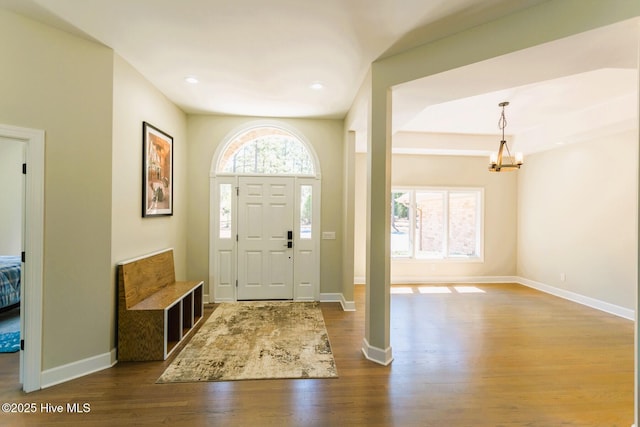 86 Sakonnet Trl, Pinehurst, NC 28374 - foyer entrance featuring dark wood-style flooring, a chandelier, baseboards, and recessed lighting