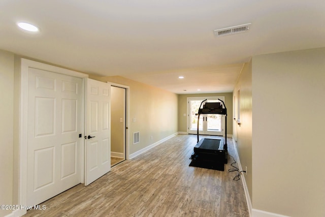 86 Sakonnet Trl, Pinehurst, NC 28374 - exercise room featuring baseboards, wood finished floors, and recessed lighting
