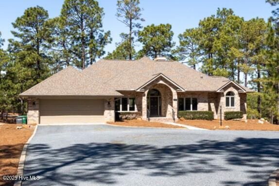 86 Sakonnet Trl, Pinehurst, NC 28374 - ranch-style house featuring driveway and a garage