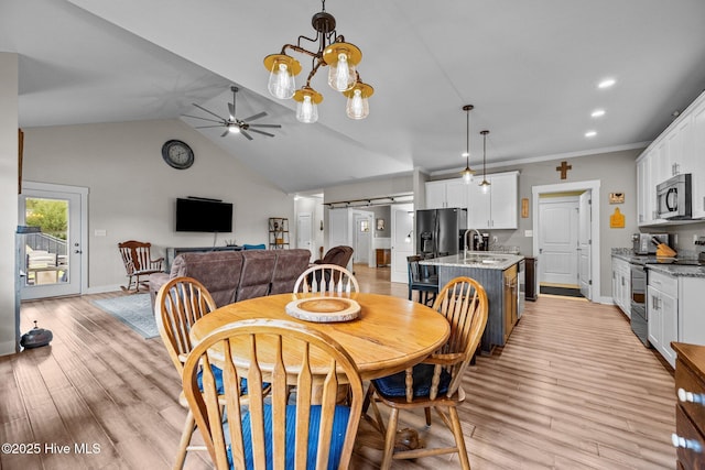 442 Crows Nest Ln, Sneads Ferry, NC 28460 - dining area with baseboards, a ceiling fan, light wood-style floors, vaulted ceiling, and recessed lighting