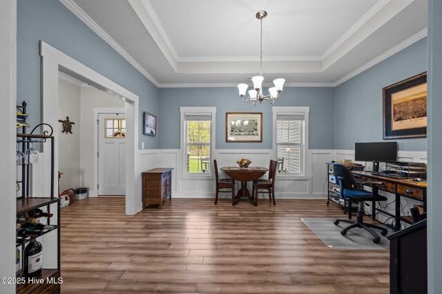 442 Crows Nest Ln, Sneads Ferry, NC 28460 - office area featuring a raised ceiling, a chandelier, wood finished floors, wainscoting, and ornamental molding