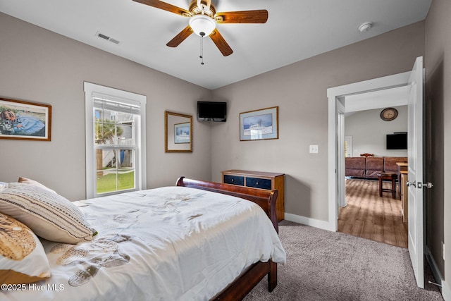 442 Crows Nest Ln, Sneads Ferry, NC 28460 - bedroom featuring carpet flooring, baseboards, and a ceiling fan