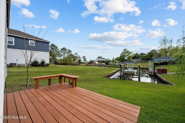 442 Crows Nest Ln, Sneads Ferry, NC 28460 - wooden terrace featuring boat lift, a dock, and a yard