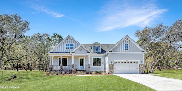 2967 Lake Pointe Dr SW, Supply, NC 28462 - craftsman house featuring board and batten siding, a porch, a front yard, and concrete driveway