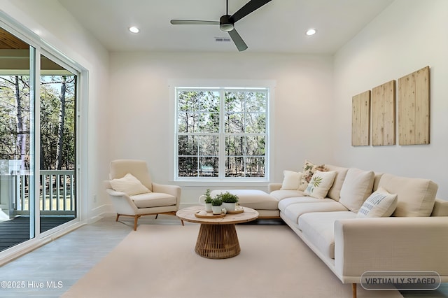 2967 Lake Pointe Dr SW, Supply, NC 28462 - living room featuring a ceiling fan, wood finished floors, recessed lighting, and a healthy amount of sunlight