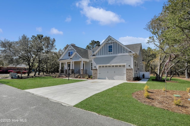 2967 Lake Pointe Dr SW, Supply, NC 28462 - craftsman inspired home featuring board and batten siding, driveway, a porch, a front yard, and a garage