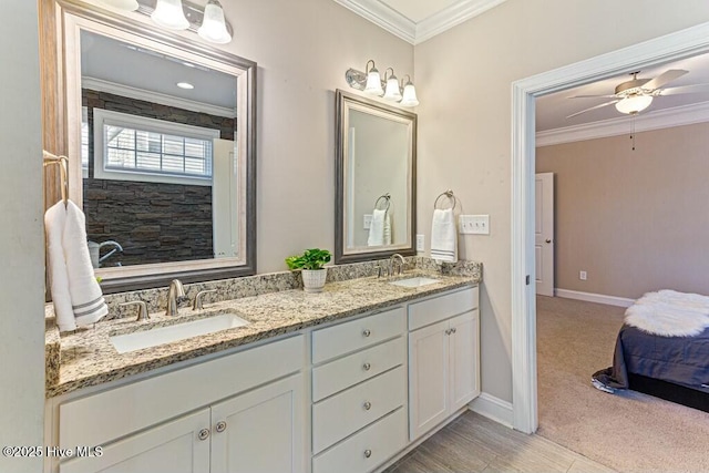 320 Thorne Rd, Pinehurst, NC 28374 - bathroom featuring ornamental molding, baseboards, double vanity, and ceiling fan