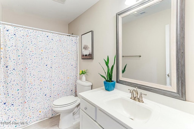 320 Thorne Rd, Pinehurst, NC 28374 - full bathroom with vanity, toilet, a shower with curtain, and wood finished floors