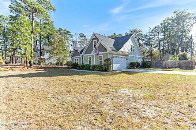 320 Thorne Rd, Pinehurst, NC 28374 - view of front facade with driveway and a garage