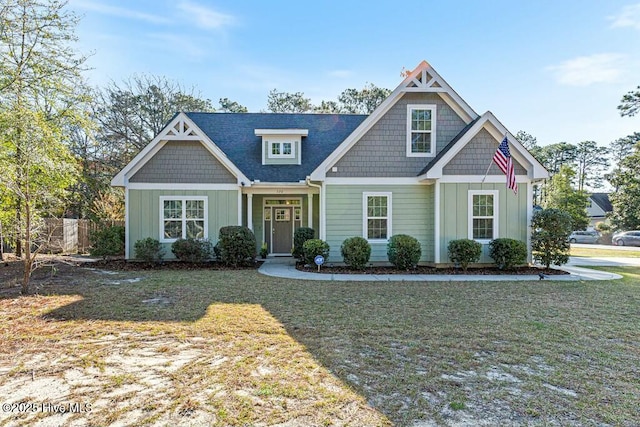 320 Thorne Rd, Pinehurst, NC 28374 - craftsman inspired home with board and batten siding and a front lawn