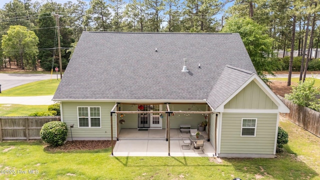 320 Thorne Rd, Pinehurst, NC 28374 - back of property with a patio area, board and batten siding, and roof with shingles