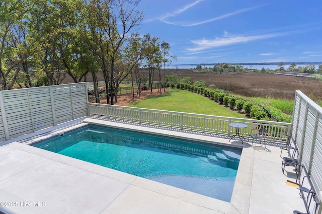 view of swimming pool with a fenced in pool, a yard, a patio, and fence