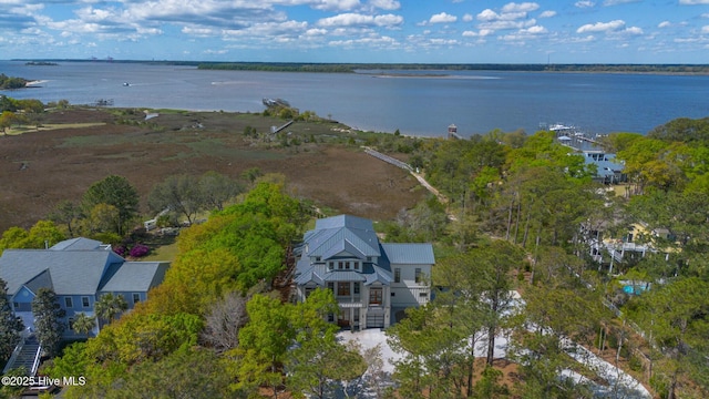 drone / aerial view with a water view